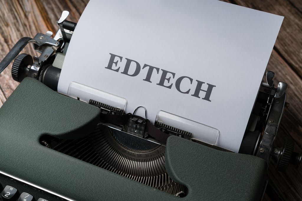 IG Followers A classic typewriter with a sheet of paper displaying the word 'EDTECH.'