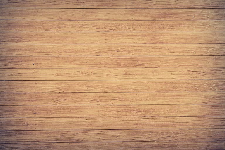Emfyteymata A high-resolution image of wooden planks showcasing a rustic texture, ideal for backgrounds and design use.