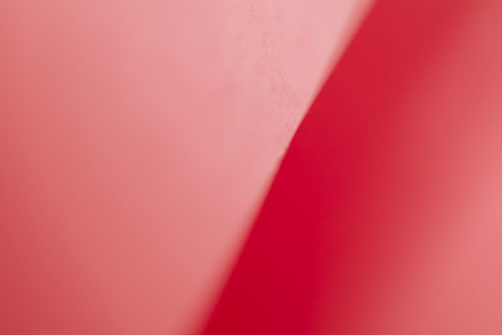 Emfyteymata A minimalist abstract background featuring layered red tones, perfect for design and art projects.