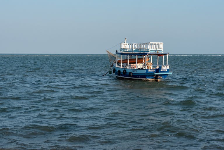 Fraboc A tranquil boat floating on the blue waters of Porto Seguro, Brazil.
