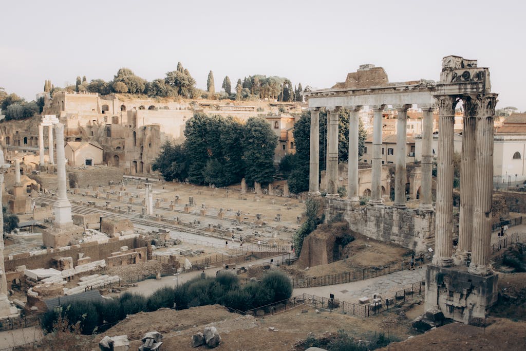 SocialMediaGirls Forum Scenic view of the historic Roman Forum ruins in Rome, Italy at daytime.