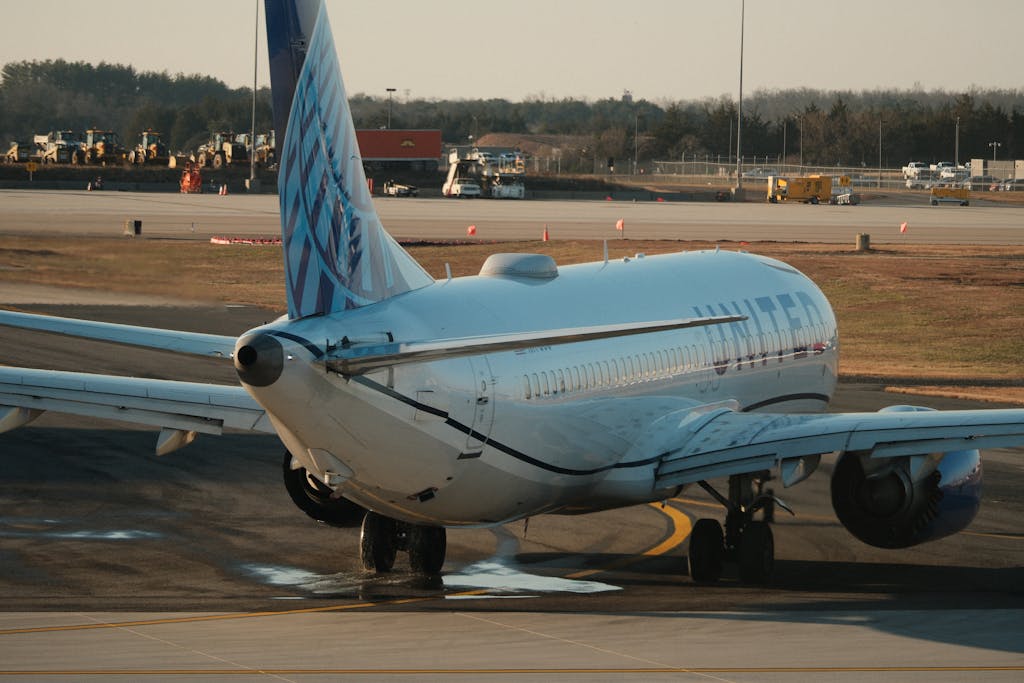 United Flight UA109 Diversion  United Airlines aircraft on runway at sunset, showcasing aviation and travel themes.